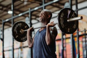 Unlocking Power: How Strength Training Transforms Physical Fitness in Olympic Combat Athletes